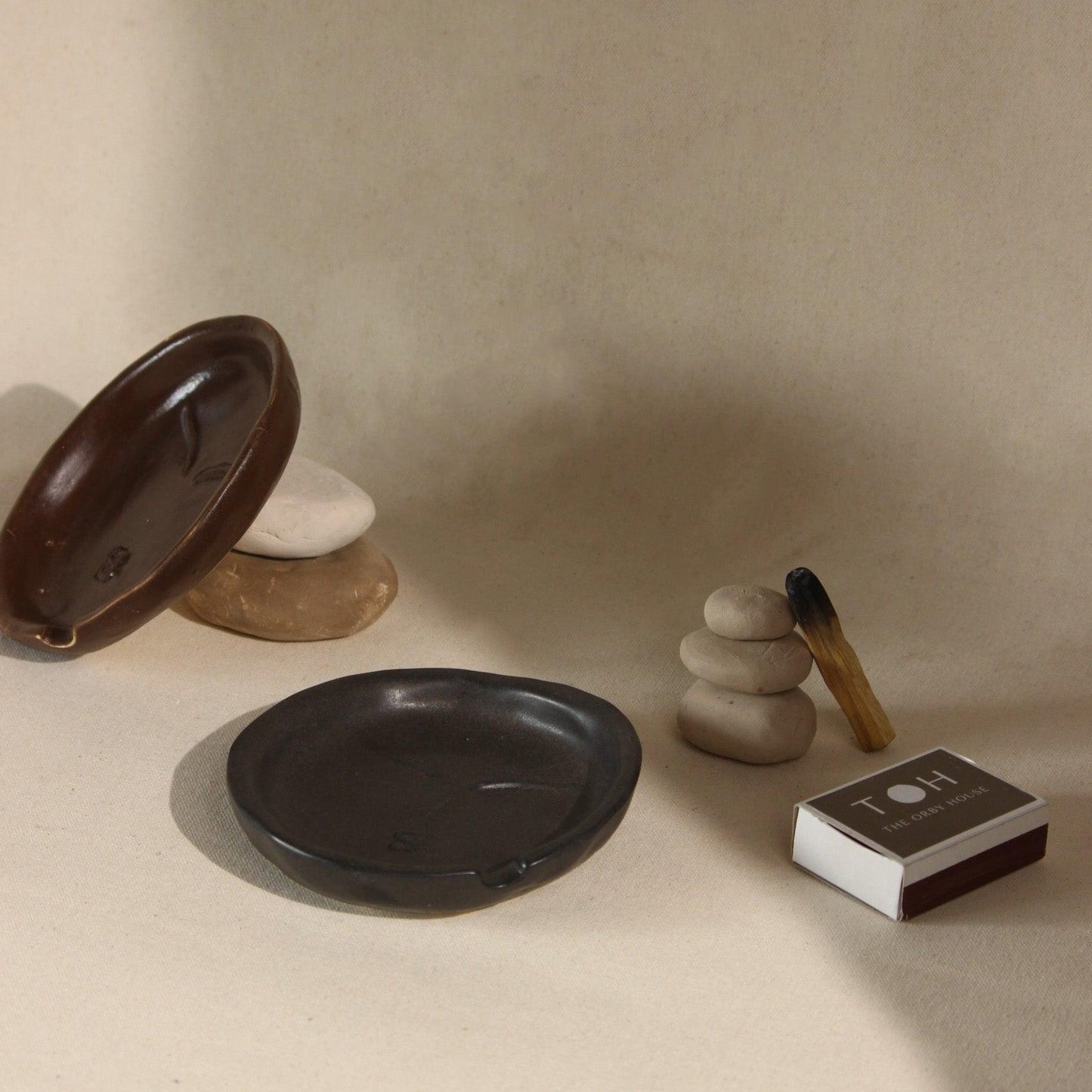 The Sage Face Ceramic Ash Tray in Black and Brown colour